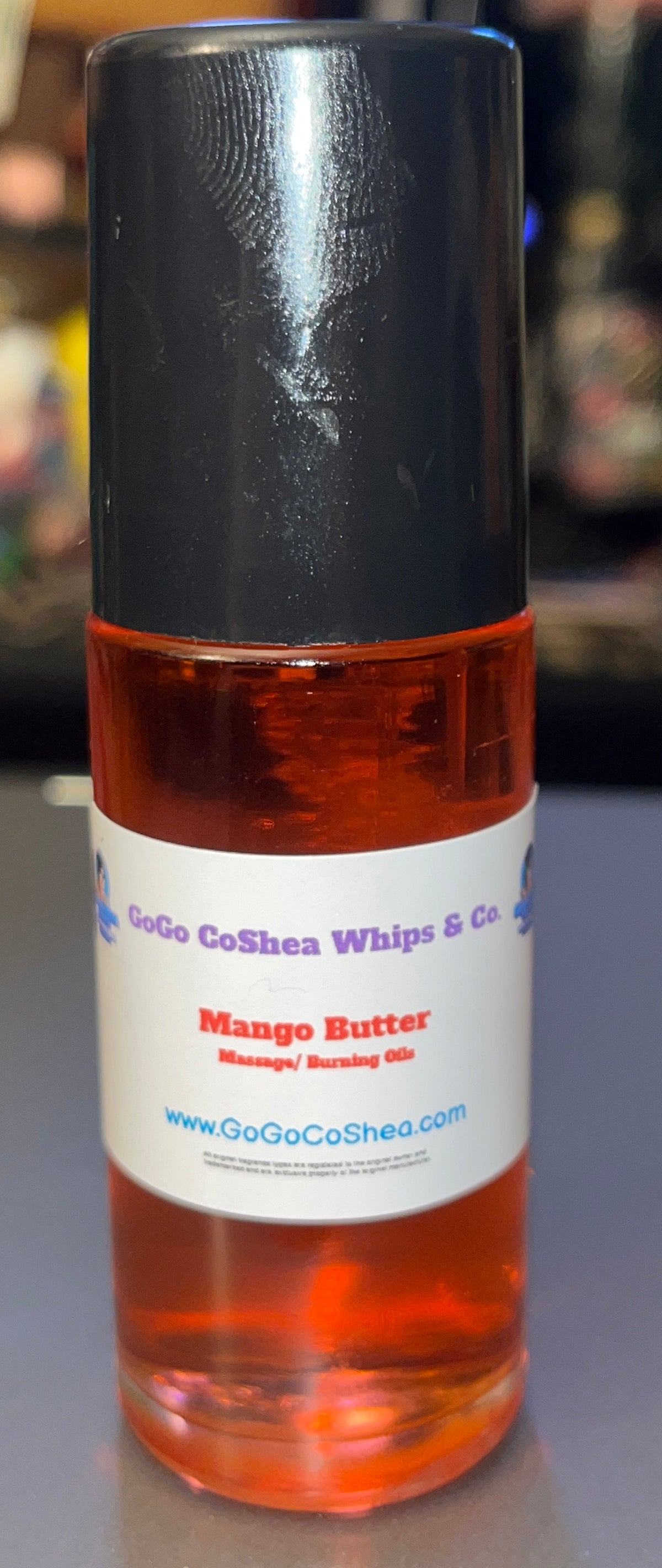 1oz. Roll- On Mango Butter Scented Massage / Burning Oil